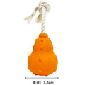 Natural rubber dog chew toy with a long strap and hollow centre for treat dispensing.