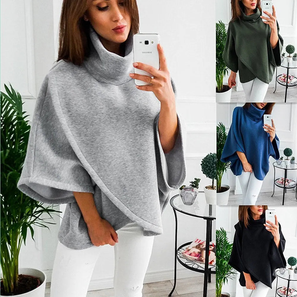 Long grey women's cardigan sweatshirt with batwing sleeves and three-button placket.
