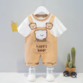 Baby wearing yellow cotton summer overalls with cartoon design, short sleeves, and adjustable straps