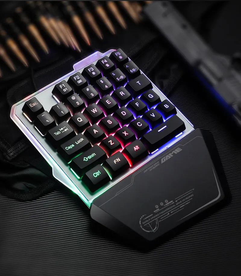 Black one-handed mechanical gaming keyboard with RGB backlit keys and USB cable