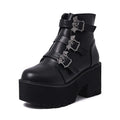Black women's punk ankle boots with bat buckle and side zip closure