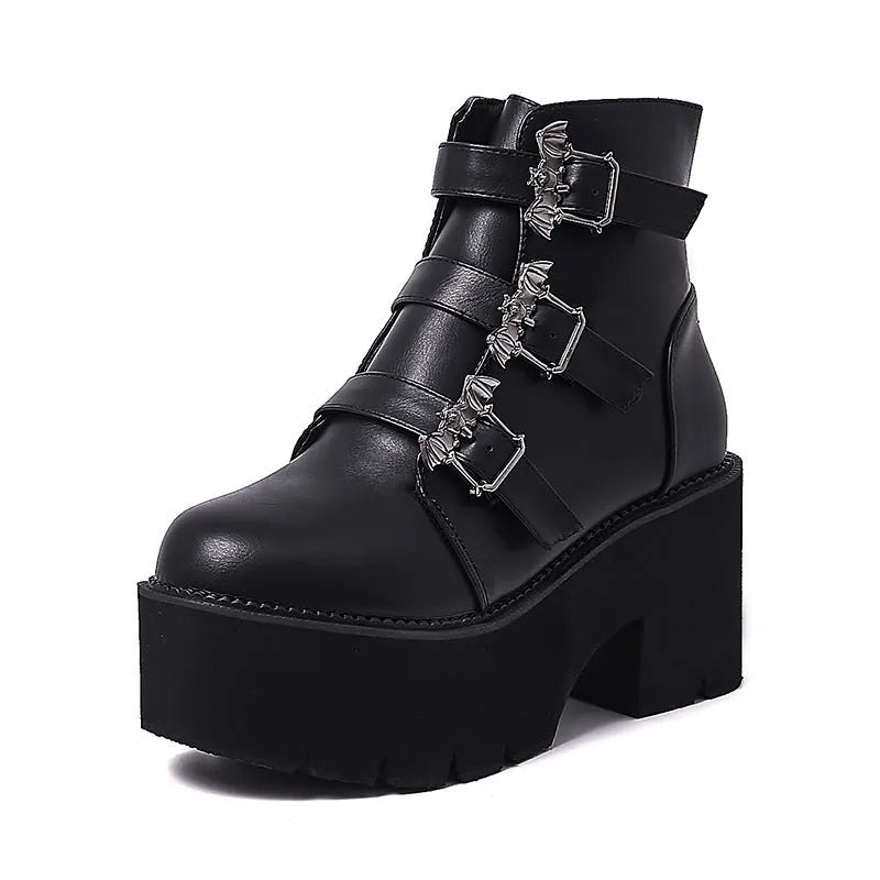 Black women's punk ankle boots with bat buckle and side zip closure