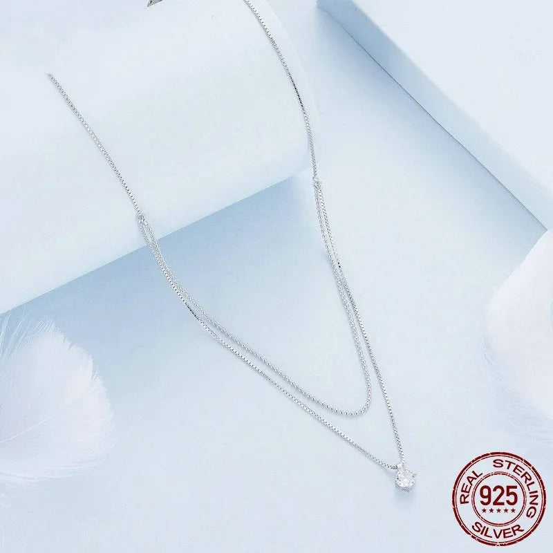 S925 sterling silver double-layer necklace with pearl chain and pendant for women.