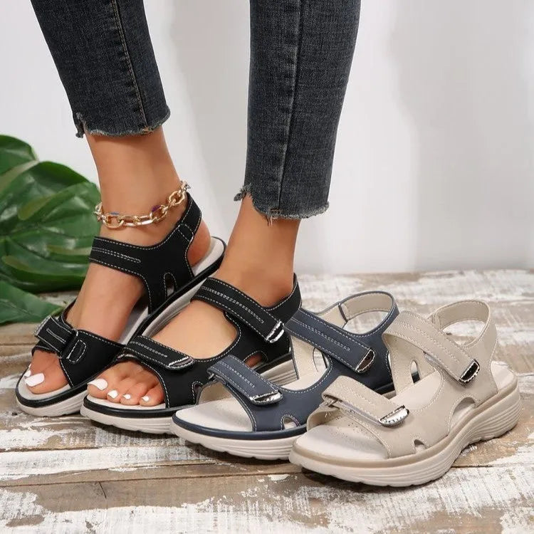 Casual Velcro-design sandals for women with fish mouth toe, hollow PU upper, and rubber sole in black colour