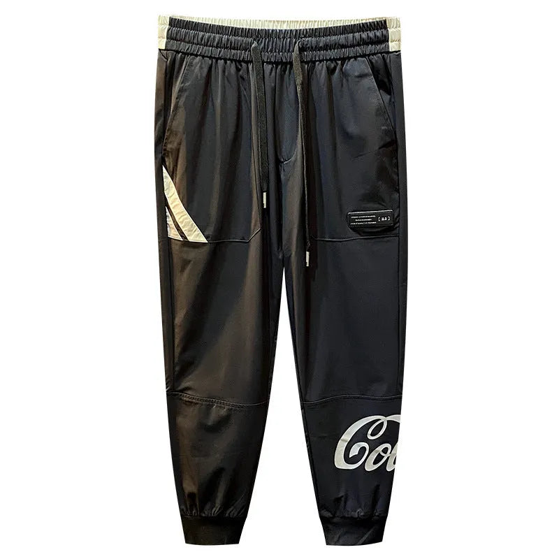 Black men's casual cropped trousers with ankle band made from ultra-thin ice silk and cotton.