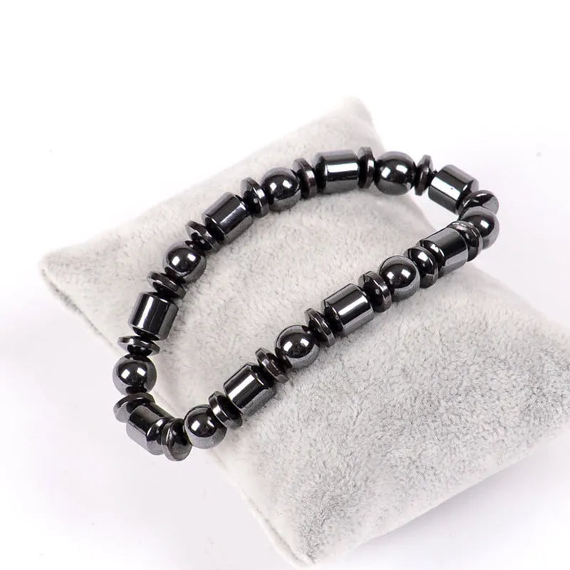 Black pentagram stone magnetic therapy bracelet with a stretch band for men and women.