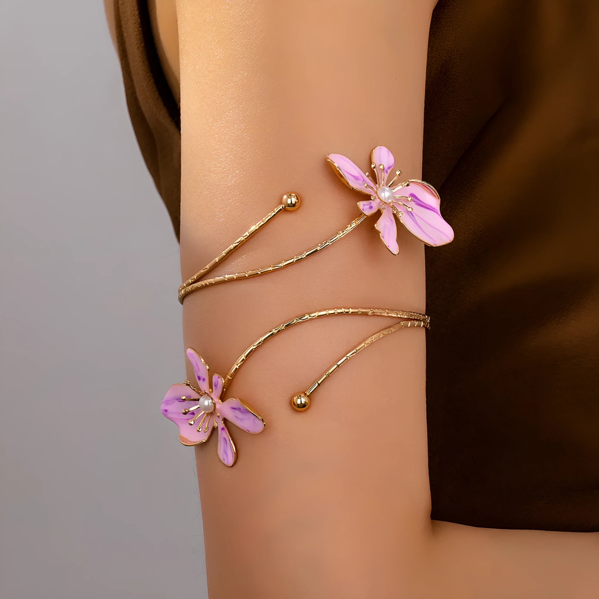 Alloy hollow armband bracelet with decorative pattern in pink or purple colour