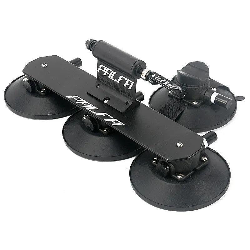 Bicycle vacuum adsorption roof rack made of aluminium alloy and rubber in red colour on a car roof