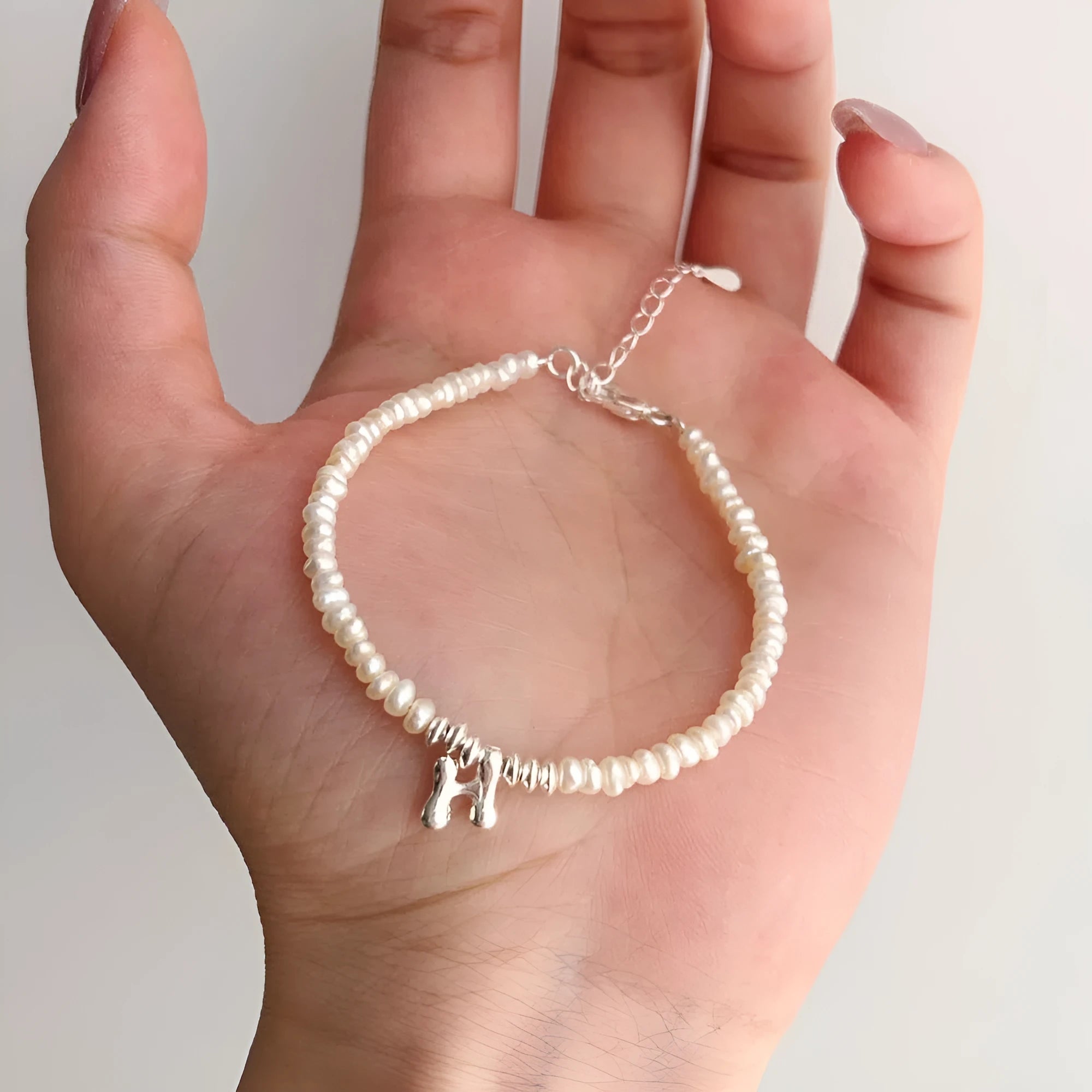Natural freshwater pearl bracelet with 925 silver chain and electroplated letter charm