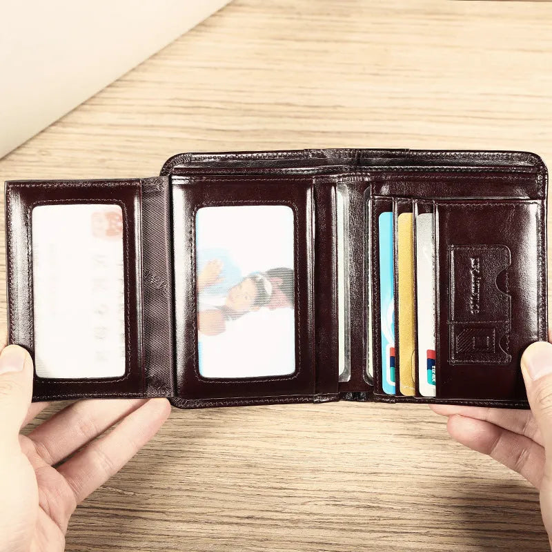 Men's leather wallet showing multiple internal compartments including card slots and change purse