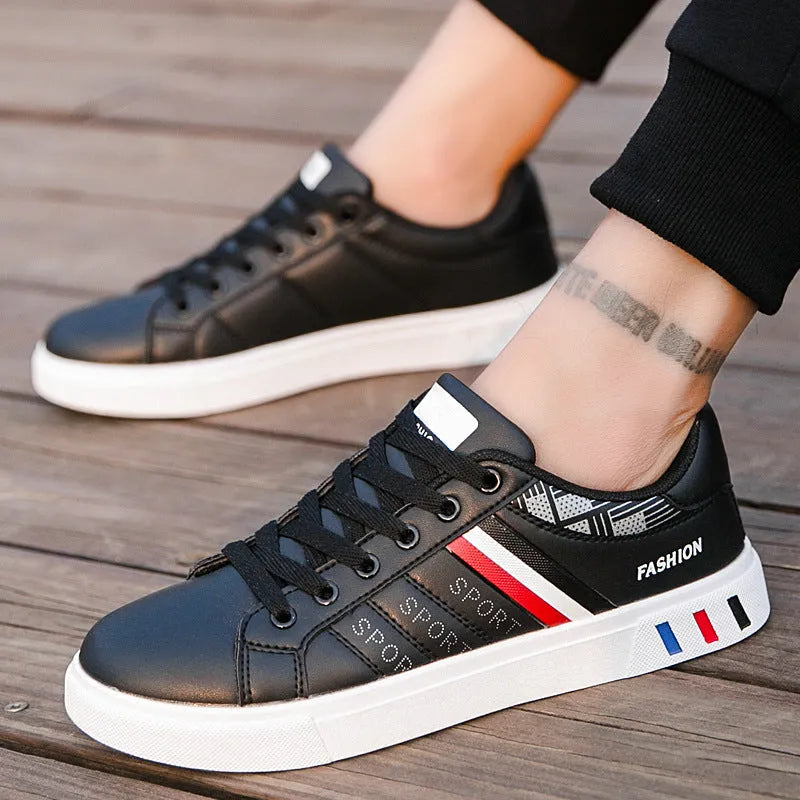 Black sports shoes on a size chart showing EU sizes 39 to 44 and corresponding foot length measurements.