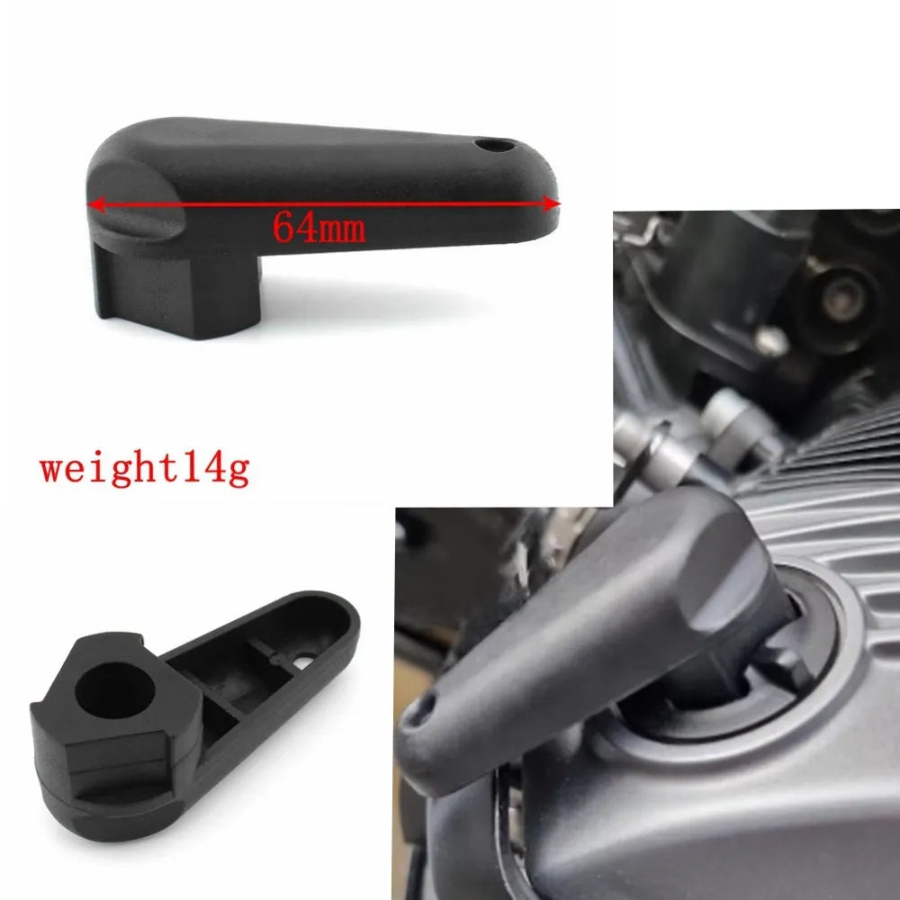 Black nylon quick-release wrench tool for BMW motorcycle oil cap on a white background.