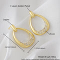 Yellow gold geometric drop earrings with zircon detailing measuring 2.6 by 1.7 centimetres