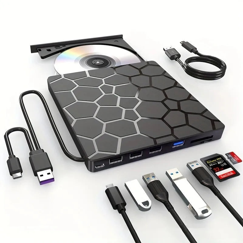 Black multifunctional external CD driver CD writer with USB cable on desk