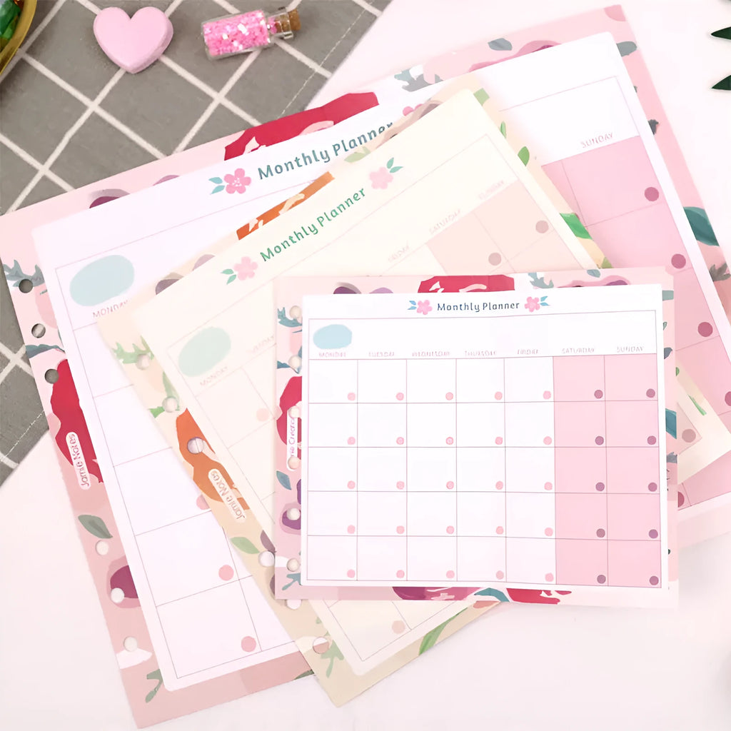 Handbook loose-leaf refill in A7 size with Floral monthly plan foldout design on paper pages