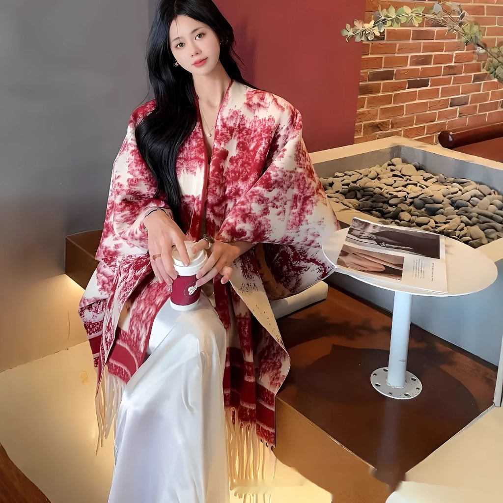 Women's polyester tassel scarf cape draped over shoulders in shawl style