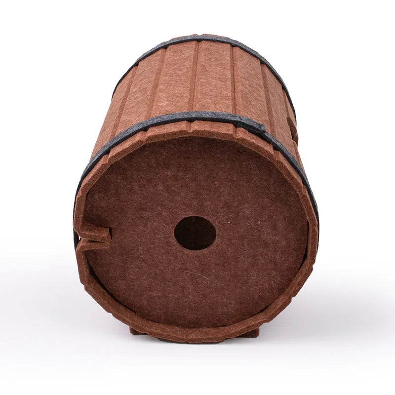 Assembled wine barrel pet bed in polyester fibre felt with binding straps, designed as a cosy cat nest
