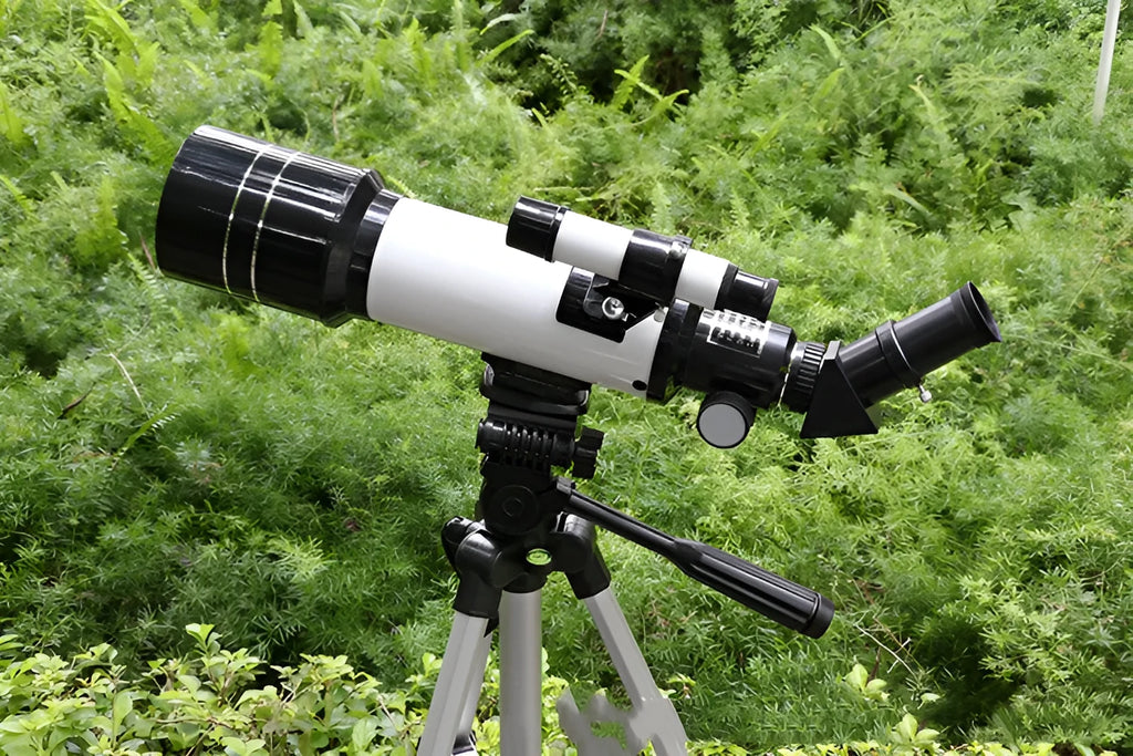Children's dark blue astronomical telescope with 16X-66X zoom on tripod for lunar observation