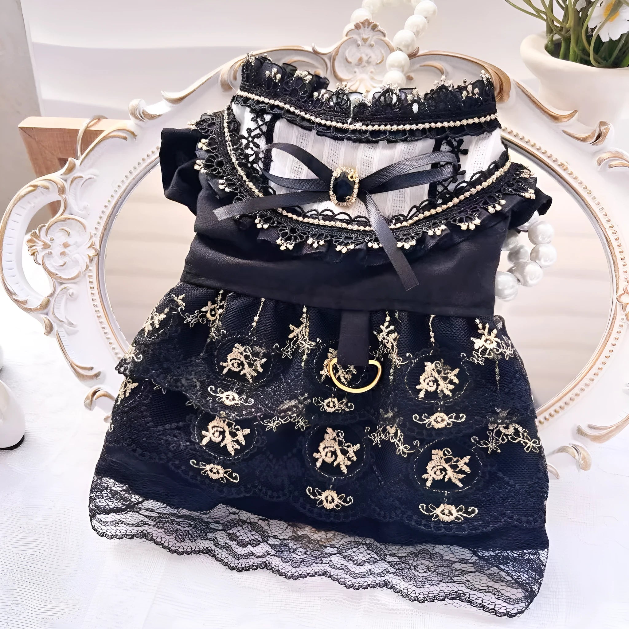 Gold Gothic princess style dress for a small dog or cat on a hanger