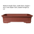 Large rectangular handmade purple clay flowerpot shown for bonsai or garden use.