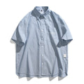 Blue striped overalls short-sleeved shirt for men and women, loose fit cardigan style, cotton blend fabric.
