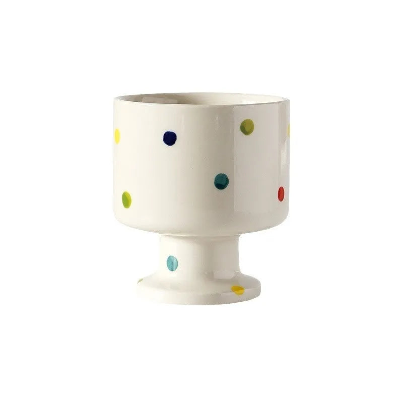 Hand-pinched irregular shaped ceramic mug in solid colour, 250ml capacity