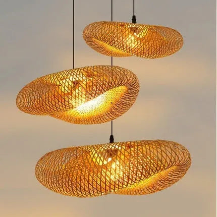 Handmade natural bamboo straw hat-shaped hanging lamp with woven rattan shade.