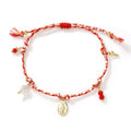 Close-up of hand-woven colourful braided rope bracelet with ethnic style and carrying strap tag function