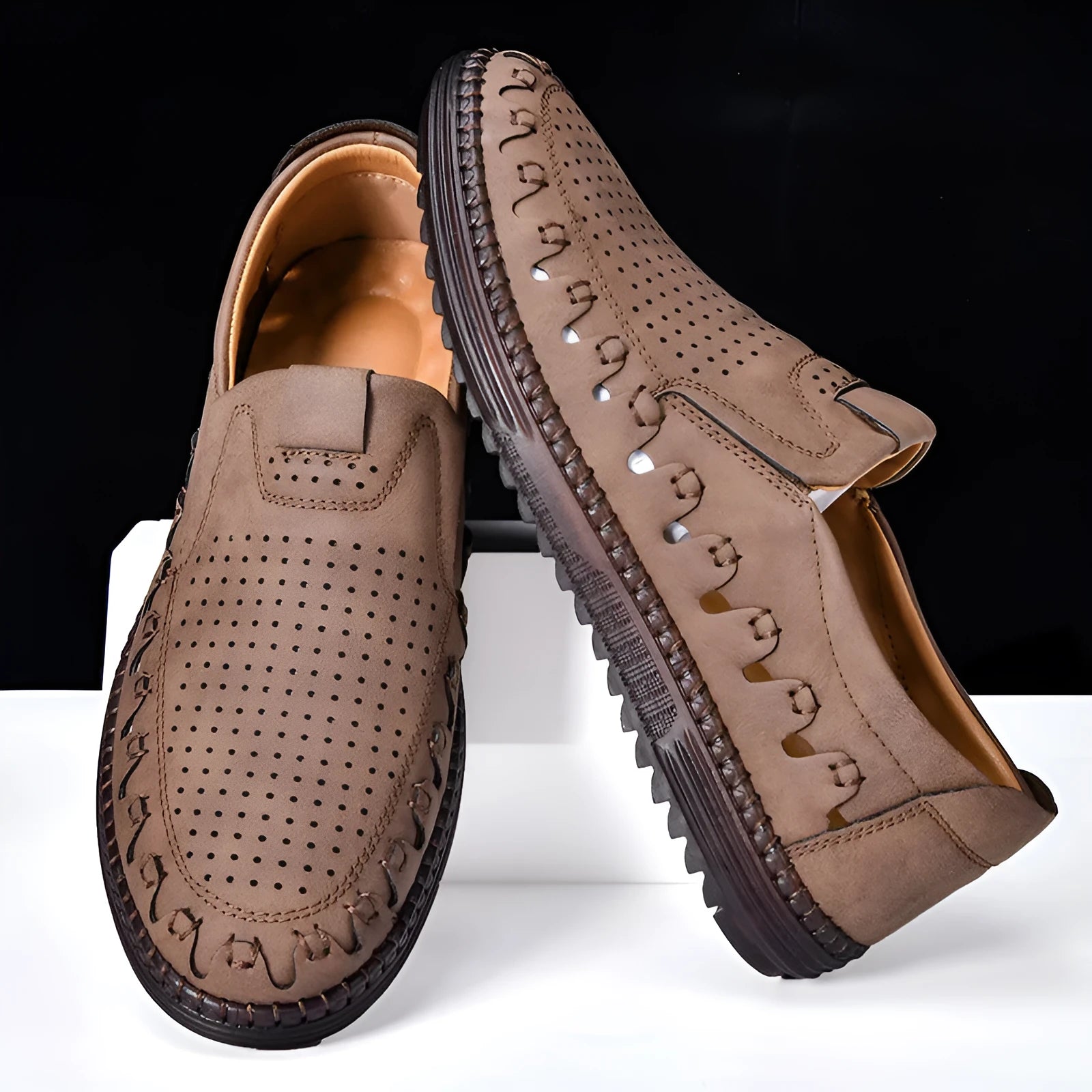 Men's brown slip-on casual shoes with round toe and sewing line detailing on flat PVC sole
