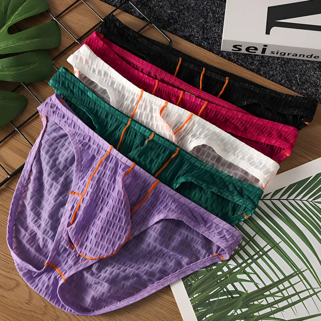 Men's low waist lace briefs in ice silk fabric on a colour swatch showing white, black, green, red, and purple.