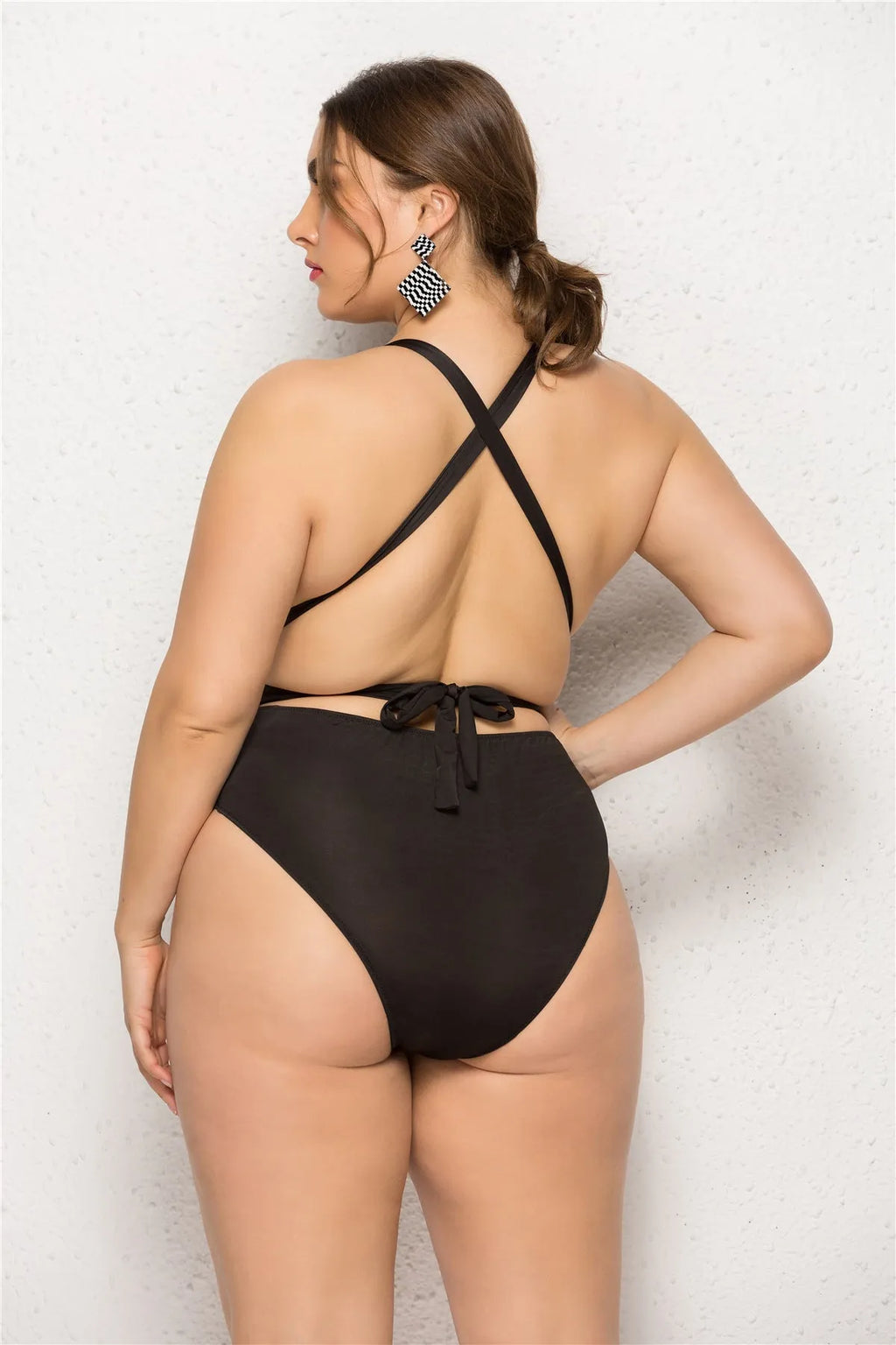 Plus size woman in black high elasticity backless one-piece swimsuit with chest pad solid colour for swimming fitness