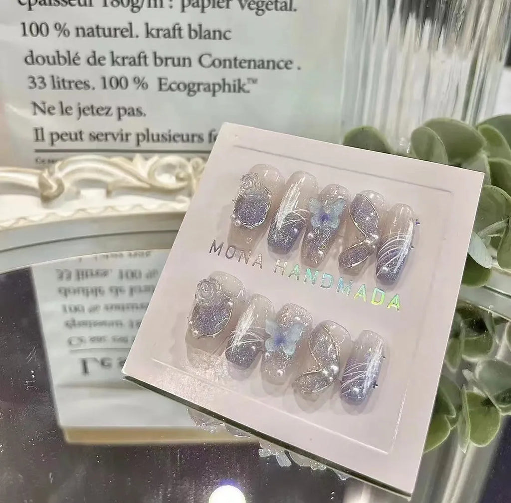 Hand-wearing bridal fake nails sequins set in four sizes with glue and tools for nail art