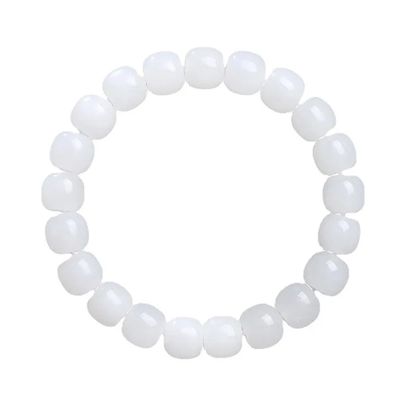 White Hetian jade barrel bead bracelet shown on a wrist, showcasing its unisex casual style.