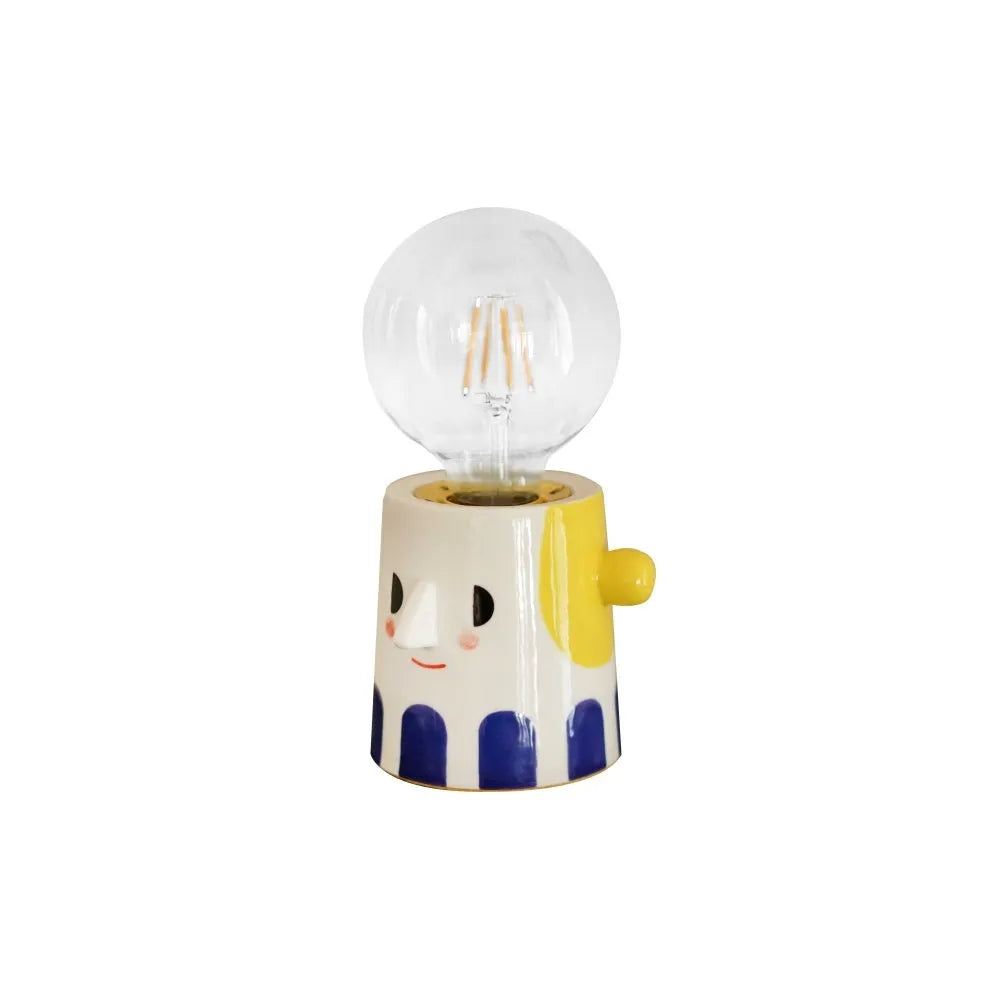 Handmade ceramic spherical ball headlight lamp on bedside table