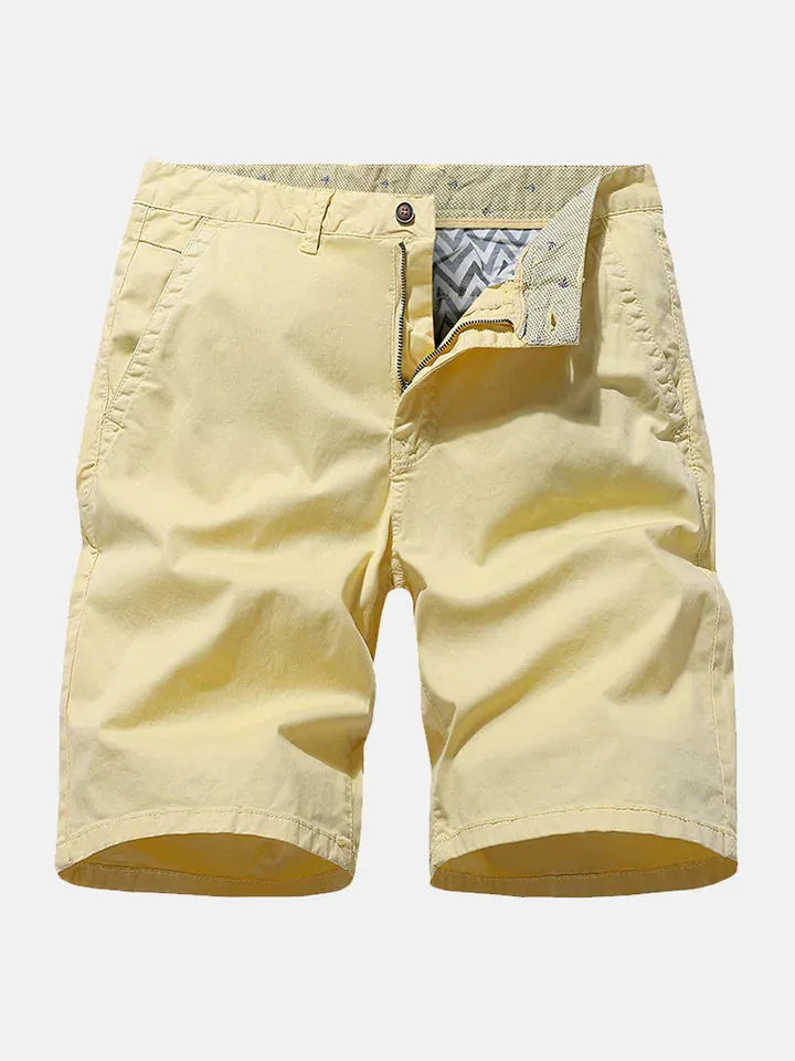 Men's blue denim casual shorts with a straight-leg cut and no belt, laid flat.