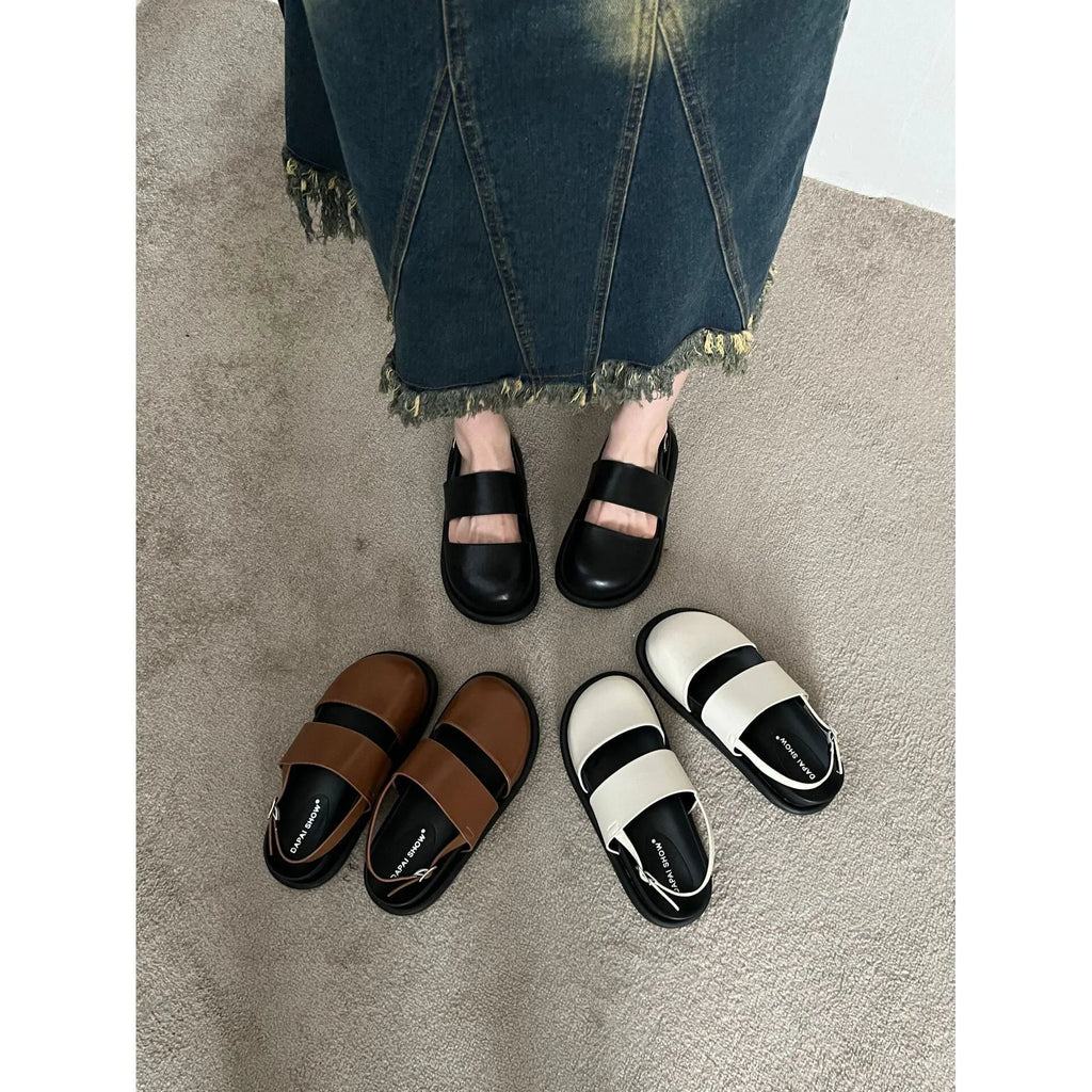 Women's retro sandals with a single ankle strap buckle and closed round toe, shown in apricot colour.