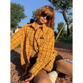 Yellow dopamine pattern plaid shirt with loose cardigan fit on hanger