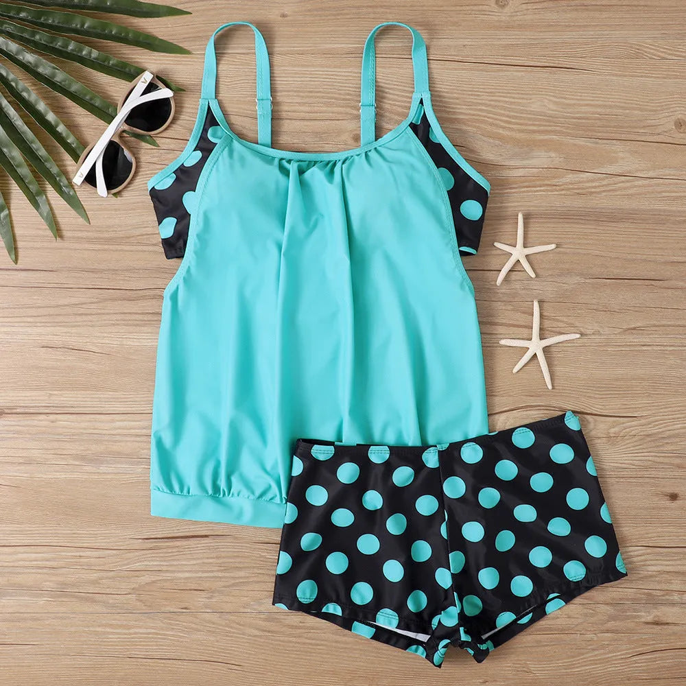 Women's high-waisted polka dot swim briefs in black, available in sizes S to 5XL.