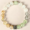 Polished crystal bracelet in khaki with 10mm geometric beads on a neutral background