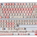 Pink PBT plastic keycap with a cute sublimated pig design on the top and sides.