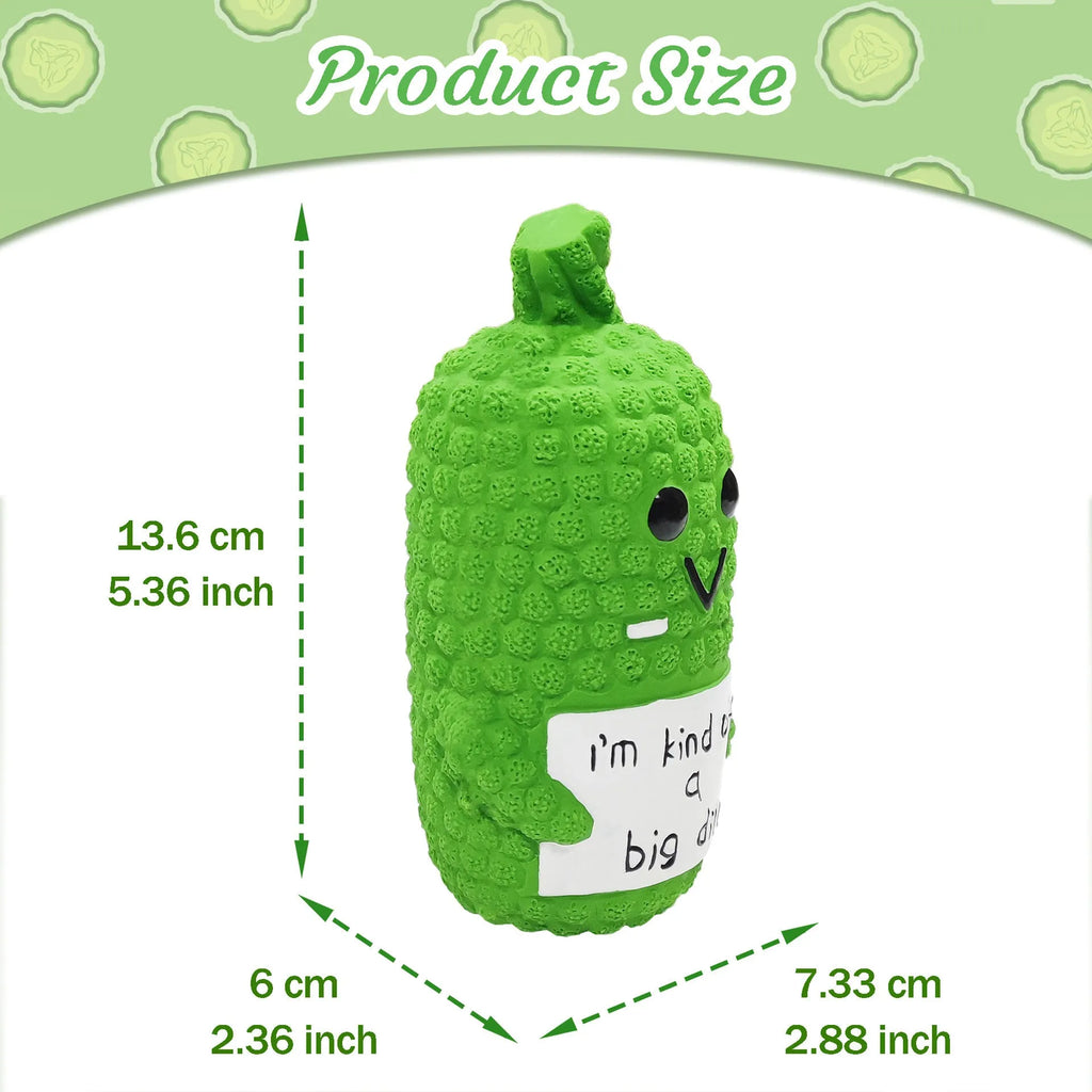 Bright green pickle-shaped latex dog chew toy with textured surface and squeaker inside