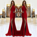 Long red knitted evening dress with hollow detail, hanging neckline, high waist, and a large swing skirt.