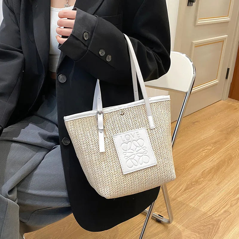 Women's woven straw shoulder bag with three-dimensional pocket in European American retro style