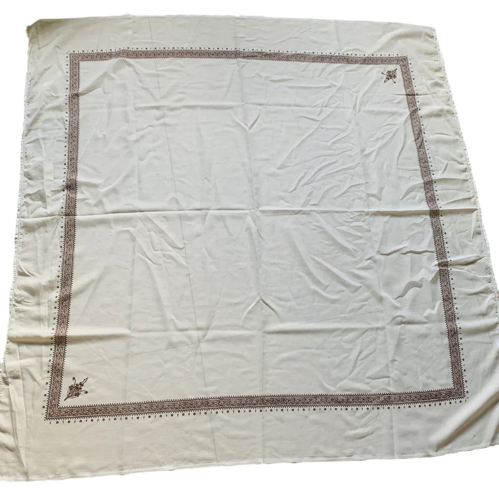 Printed square scarf in brown, 138x138cm polyester unisex scarf laid flat showing square shape and colour.