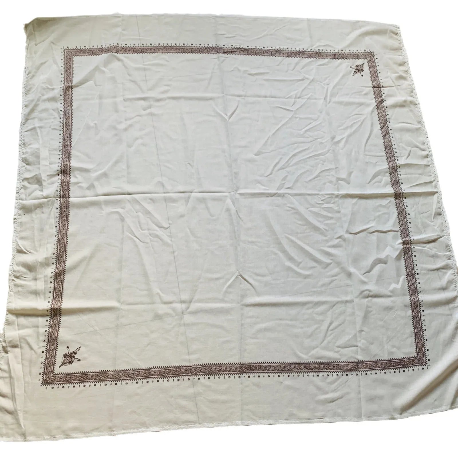 Printed square scarf in brown, 138x138cm polyester unisex scarf laid flat showing square shape and colour.