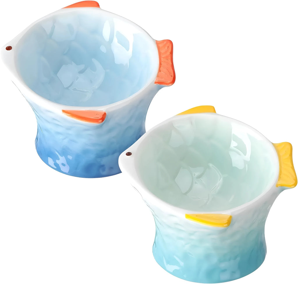 Fish-shaped ceramic cat bowls with elevated design and 15-degree tilt angle in blue, green, pink or yellow