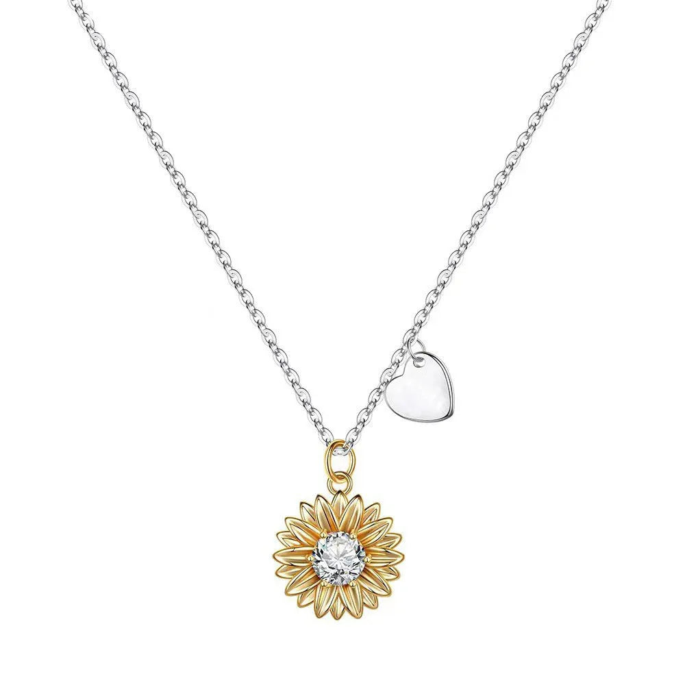 Women's sunflower-themed 925 silver pendant necklace with geometric petals on an adjustable cross chain.