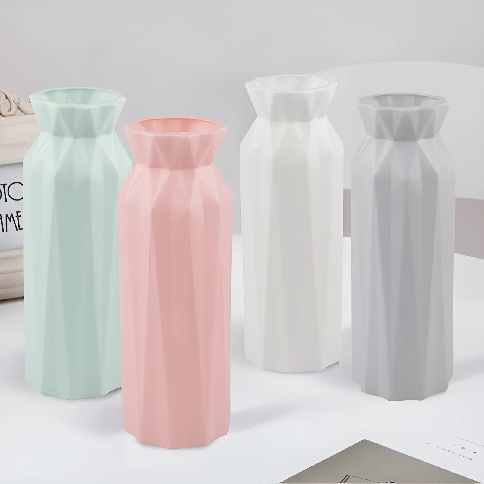 Green drop-resistant melamine vase with 7.2cm base diameter on a desktop