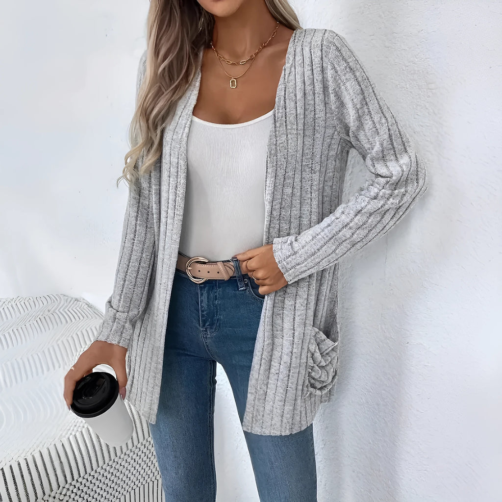 Solid colour long sleeve cardigan with front pockets, loose fit polyester knitwear