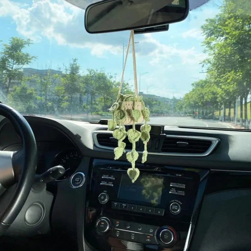 Green and white knitted wool car plant decoration with 25cm hanging rope on car dashboard